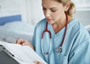 Travel nurse reading travel nursing resources